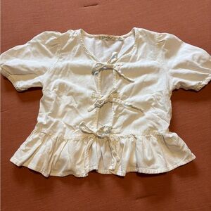 White Peplum Blouse with Bow Details